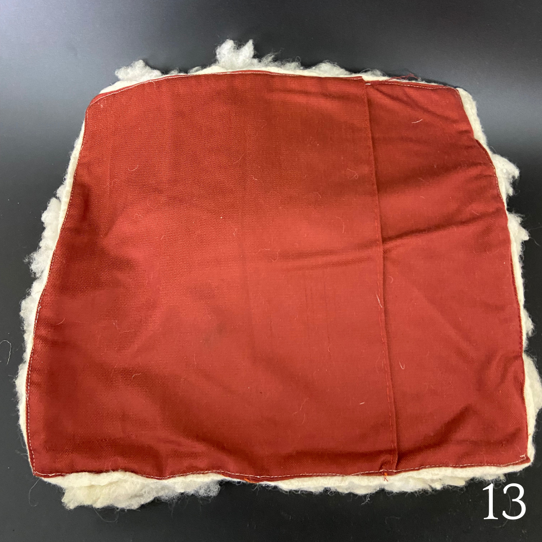 White felted merino wool cushion covers with recycled fabric backside