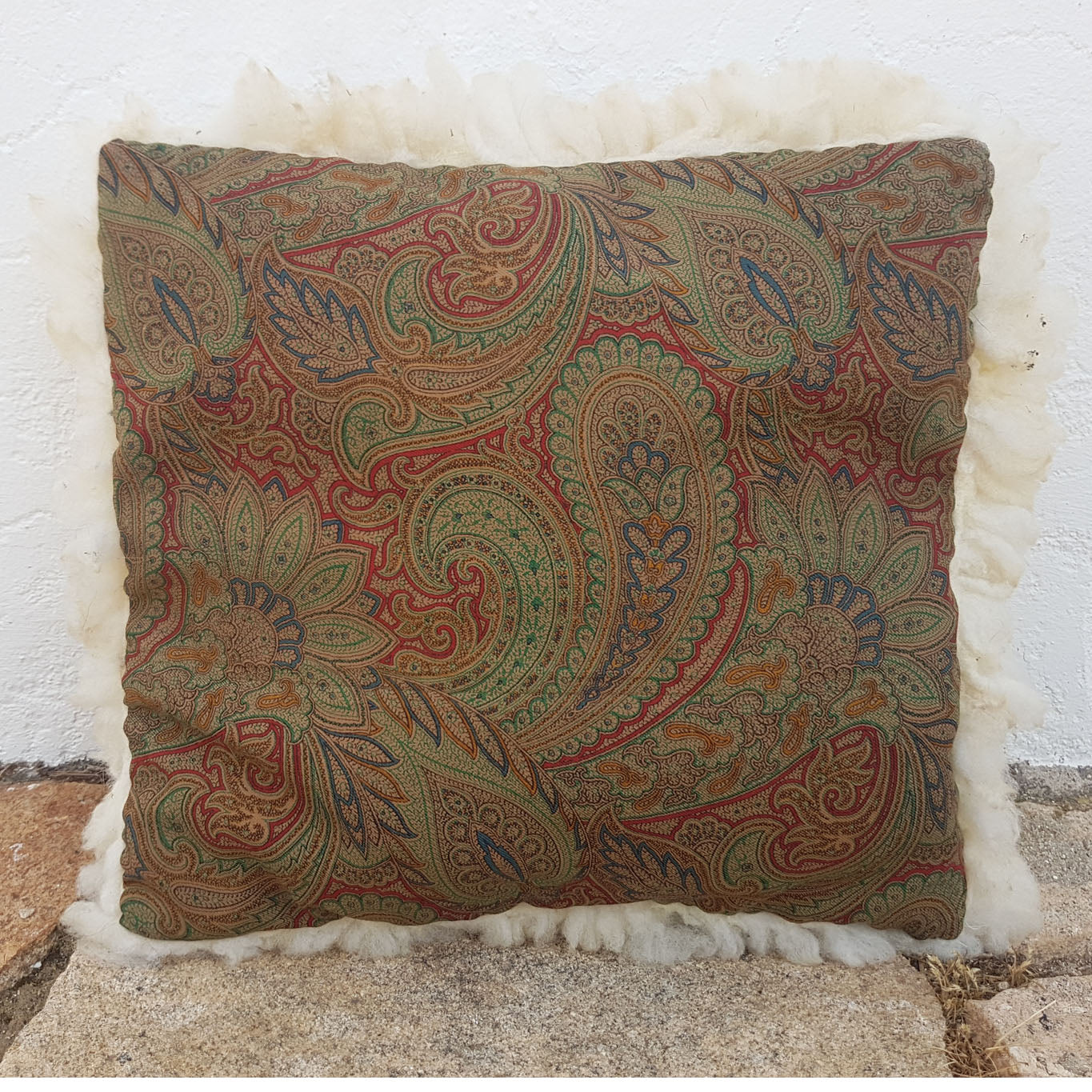 White felted wool cushion with upcycled fabric rear side