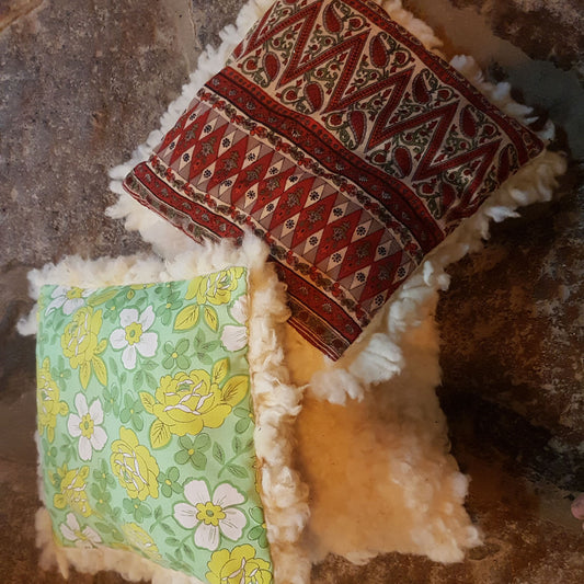 White felted wool cushion with upcycled fabric rear side