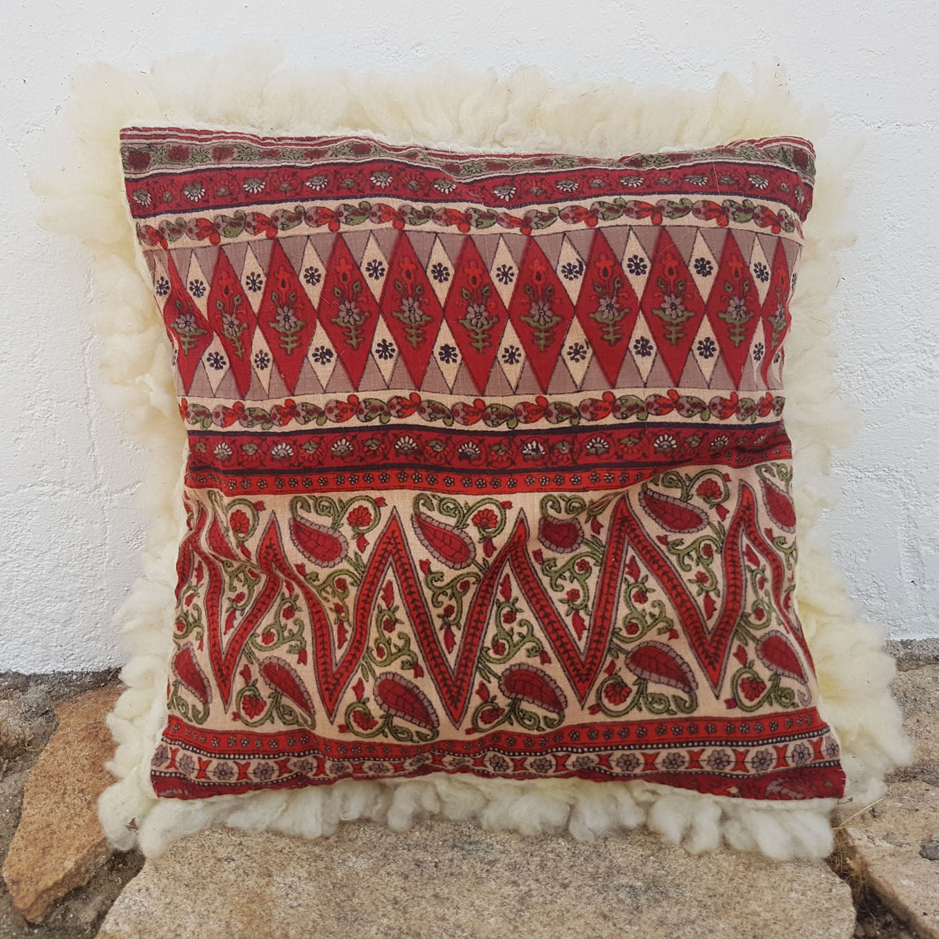White felted wool cushion with upcycled fabric rear side
